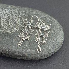 Srebrne kolczyki z błękitnym topazem