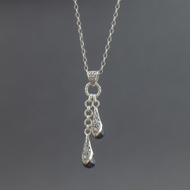 Srebrny wisiorek z onyksem