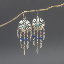 Srebrne kolczyki łapacze słów