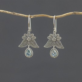 Srebrne kolczyki z błękitnym topazem